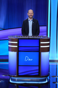 Dan behind the Jeopardy! podium.